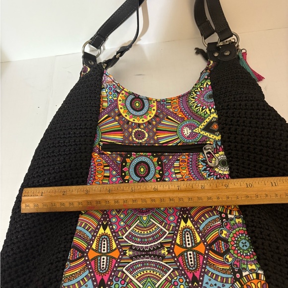 Sakroots bag, characterized by its distinctive bohemian and colorful design. - Picture 11 of 12